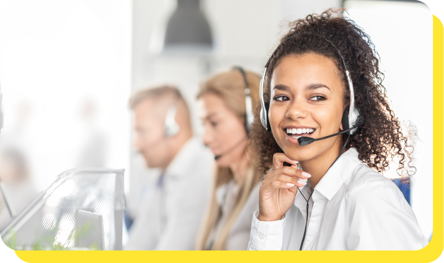 Woman on the phone providing friendly customer support about personal loans, encouraging borrowers to call Serve and Protect Credit Union with questions or concerns, and linking to the contact us page.