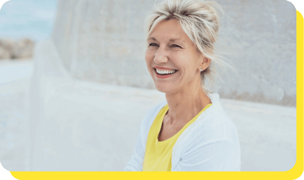 Woman smiling confidently, showcasing the advantages of a Fixed Cash ISA.