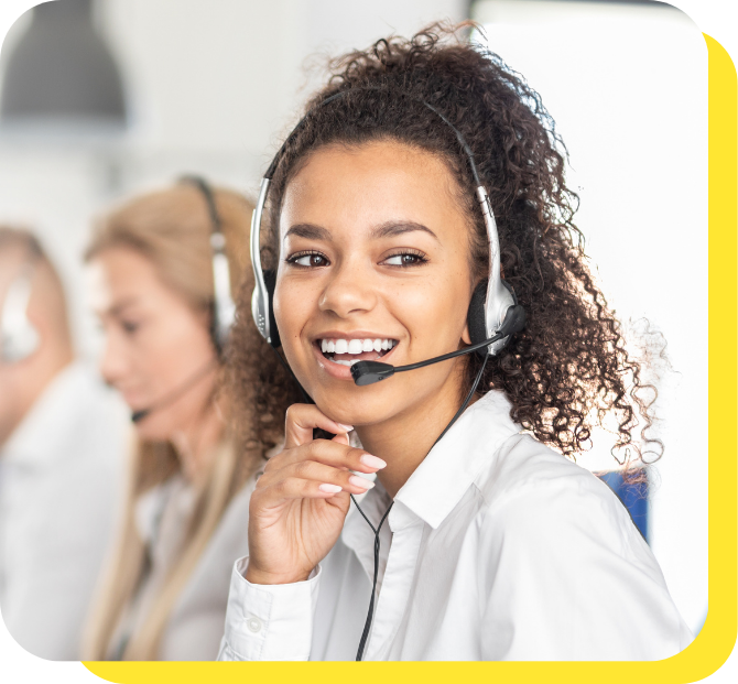 Woman on the phone providing friendly customer support about personal loans, encouraging borrowers to call Serve and Protect Credit Union with questions or concerns, and linking to the contact us page.