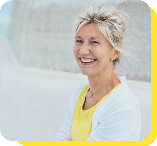 Woman smiling confidently, showcasing the advantages of a Fixed Cash ISA.