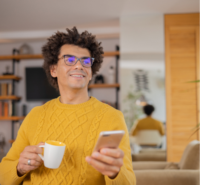 Man with Coffee Using Regular Savings Account