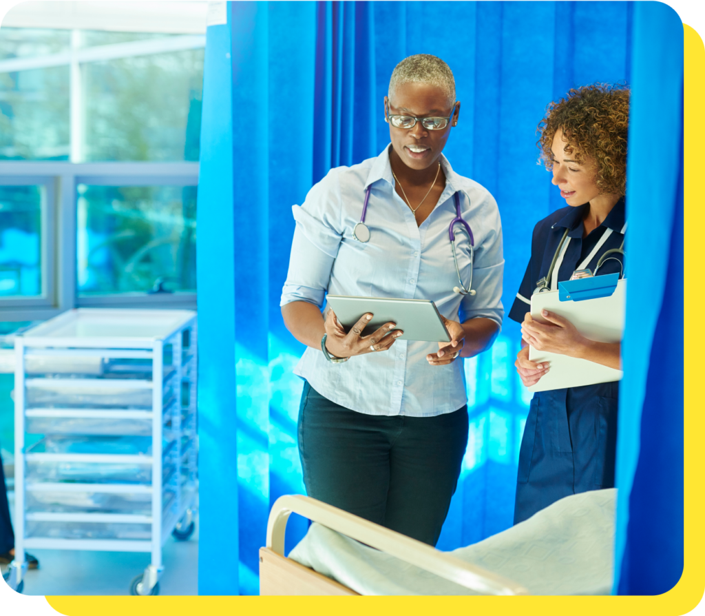 NHS doctor and nurse working together, sharing information about an NHS credit union services for staff.