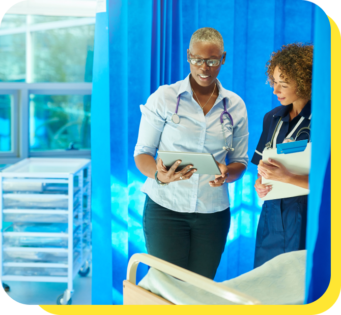 NHS doctor and nurse working together, sharing information about an NHS credit union services for staff.