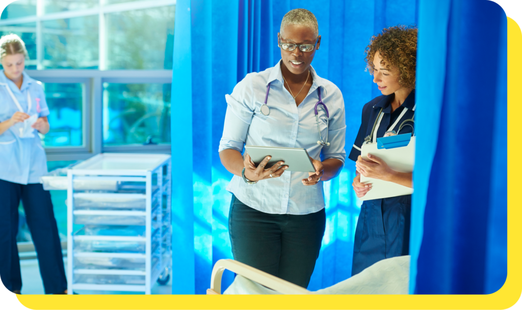 NHS doctor and nurse working together, sharing information about an NHS credit union services for staff.