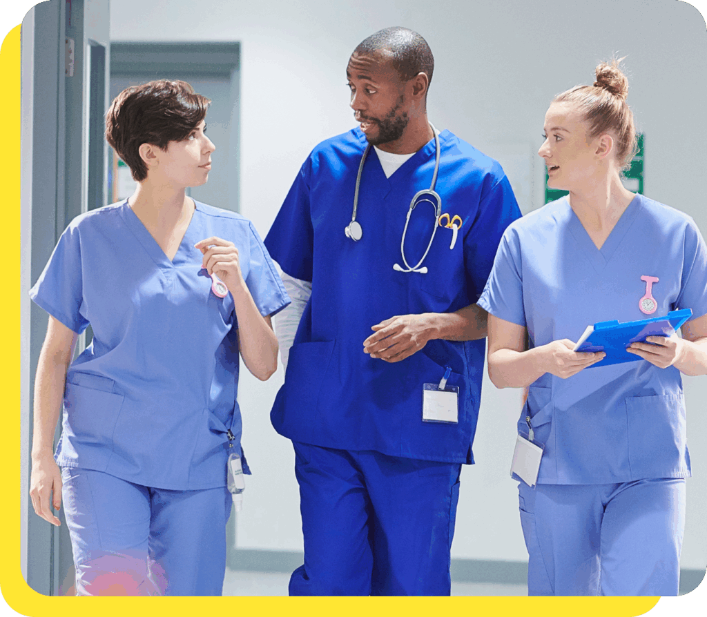 Healthcare professionals smiling together, representing our credit union's trusted partnership with NHS Trusts