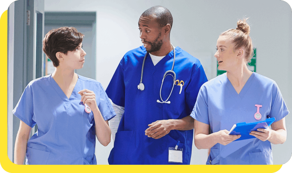 Healthcare professionals smiling together, representing our credit union's trusted partnership with NHS Trusts