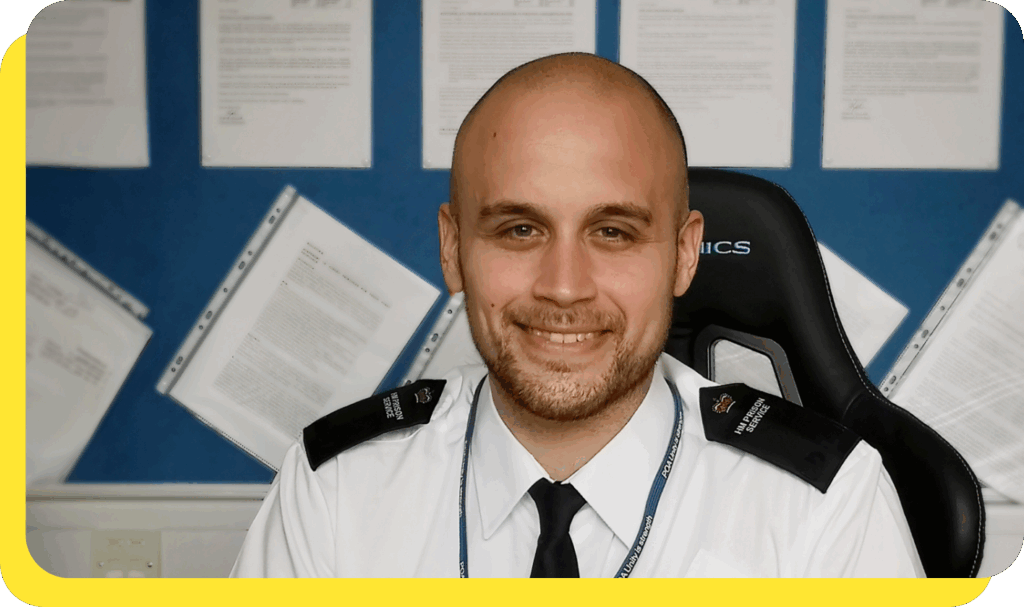 Smiling prison officer representing our credit union's decades-long commitment to supporting prison and probation service workers.