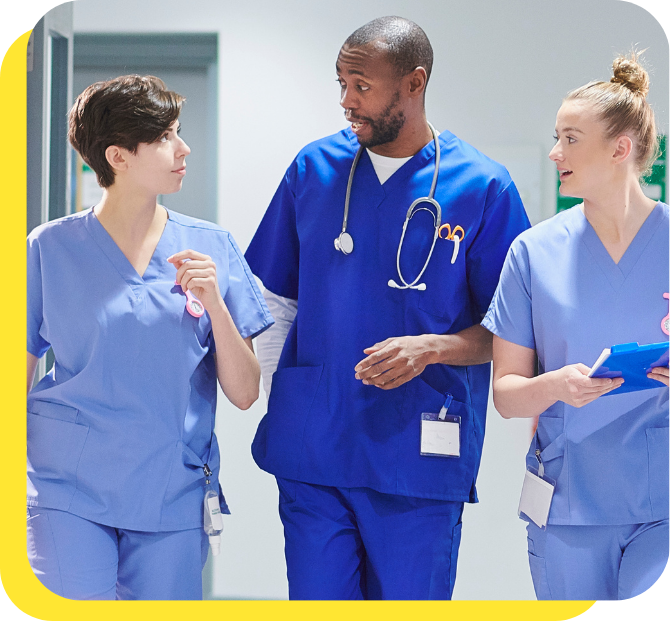 Healthcare professionals smiling together, representing our credit union's trusted partnership with NHS Trusts