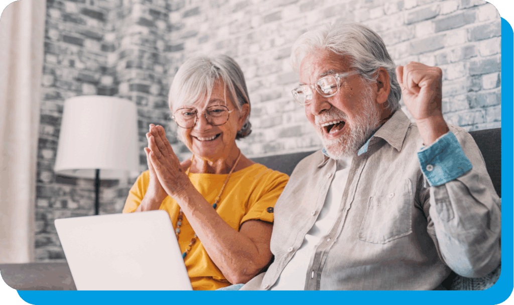 Couple celebrating after seeing their credit union lottery win