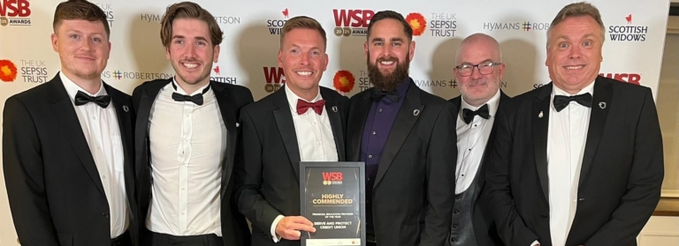 Six members of the Serve and Protect Credit Union team stand with their award as Highly Commended in Financial Education Provider of the Year at the WSB Awards 2025