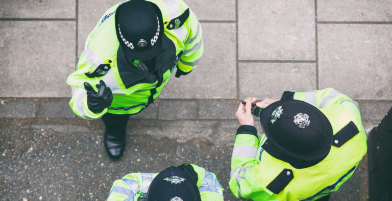 Birds-eye shot of police officers talking